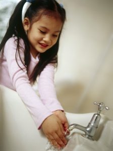 Hand washing MODEL RELEASED. Washing hands. Five-year-old girl washing her hands at a bathroom sink. Credit IAN BODDY / SCIENCE PHOTO LIBRARY / Universal Images Group Rights Managed / For Education Use Only